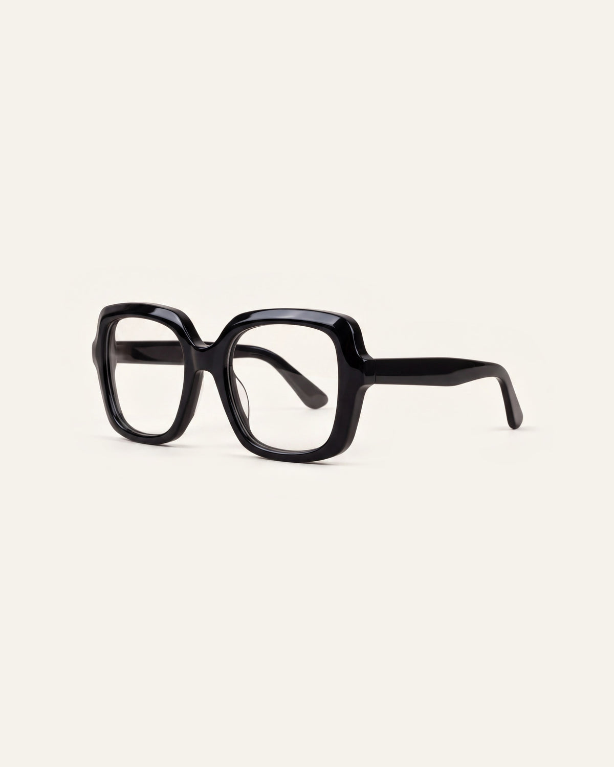 Elara in black, three-quarter view
